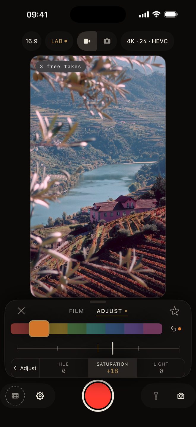 hazecam screen with the ADJUST tab open on HSL, over a vineyard landscape
